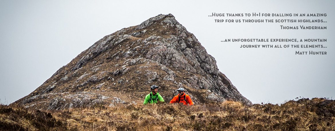 Matt Hunter and Thomas Vanderham on our coast-to-coast Scotland mountain bike tour, taking in the view on their biking holiday, coast-to-coast scotland award winning