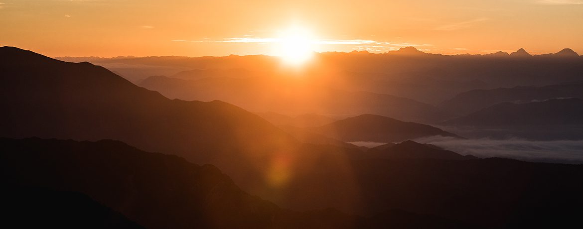 Sunset from the Ghost Lake Hut on the Old Ghost Road during a mountain bike tour New Zealand.