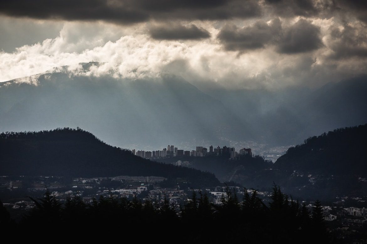 Moody skies over Quito, mountain biking in Ecuador